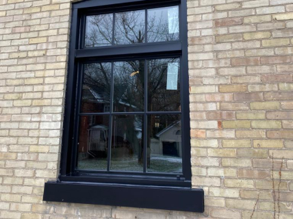 big window with bricks